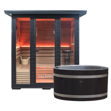 Chill Bunny sauna with black frame and wooden interior glowing with warm lights next to a matching black ice bath