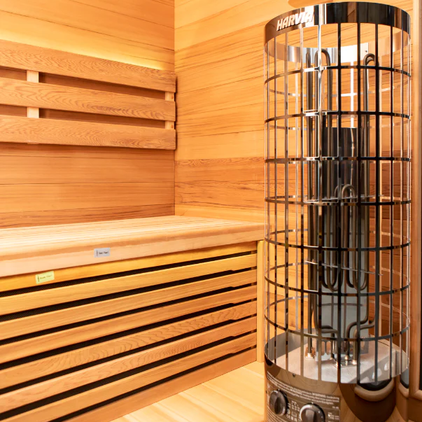 Chill Bunny sauna interior with wooden benches and modern heater for home relaxation