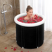 Woman in an entry level portable ice bath