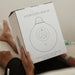 Hydrogen Health portable hydrogen breathing system packaging held by person lying down
