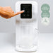 Hydrogen Health hydrogen water device dispensing water into a clear glass pitcher with touch control panel