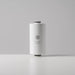 Hydrogen Health white hydrogen personal care shower filter replacement cartridge on gray background