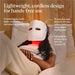 Therabody LED mask with lightweight cordless design, adjustable straps, and protective eye shields for hands-free use