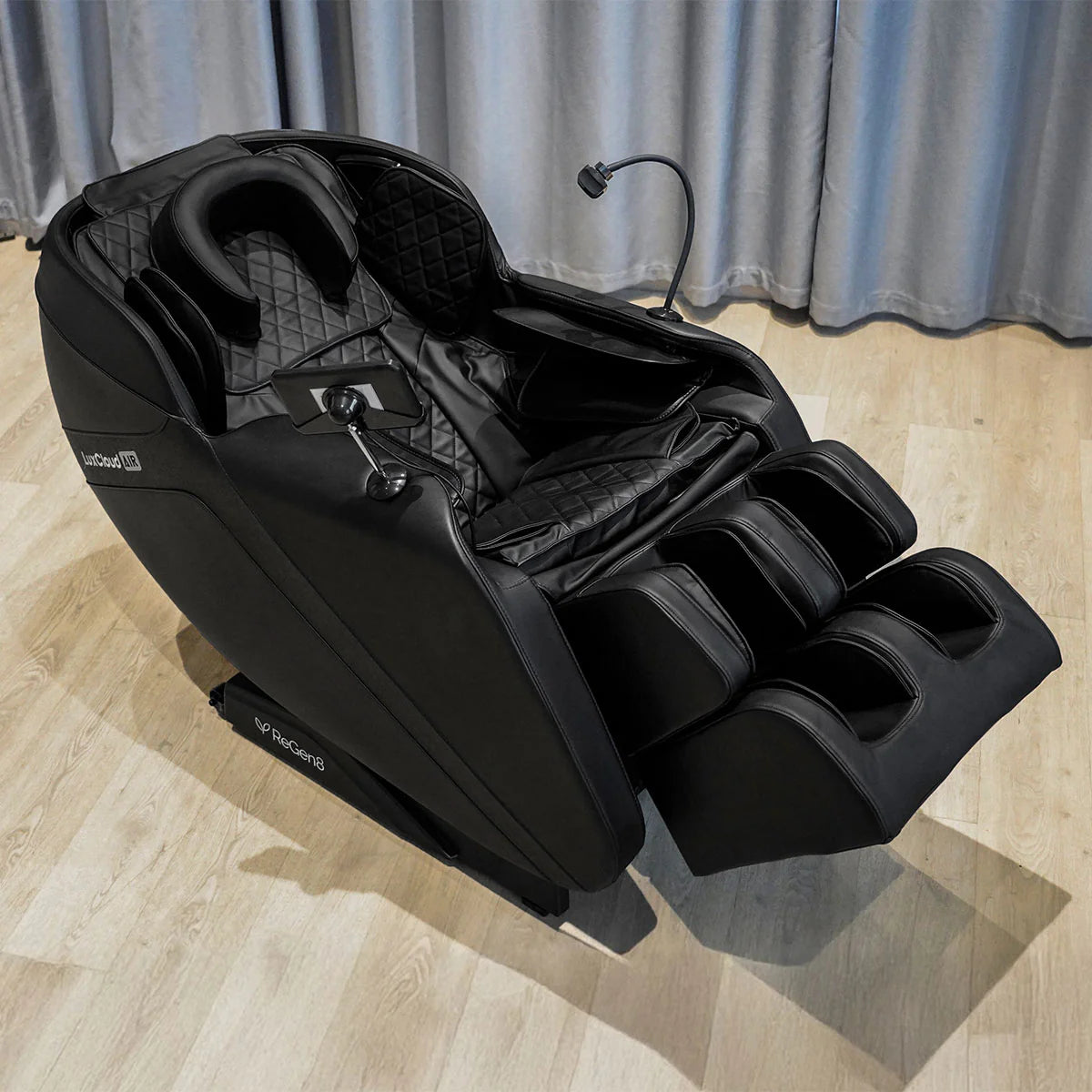 Lifespan Fitness black massage chair with adjustable footrest and built-in reading light