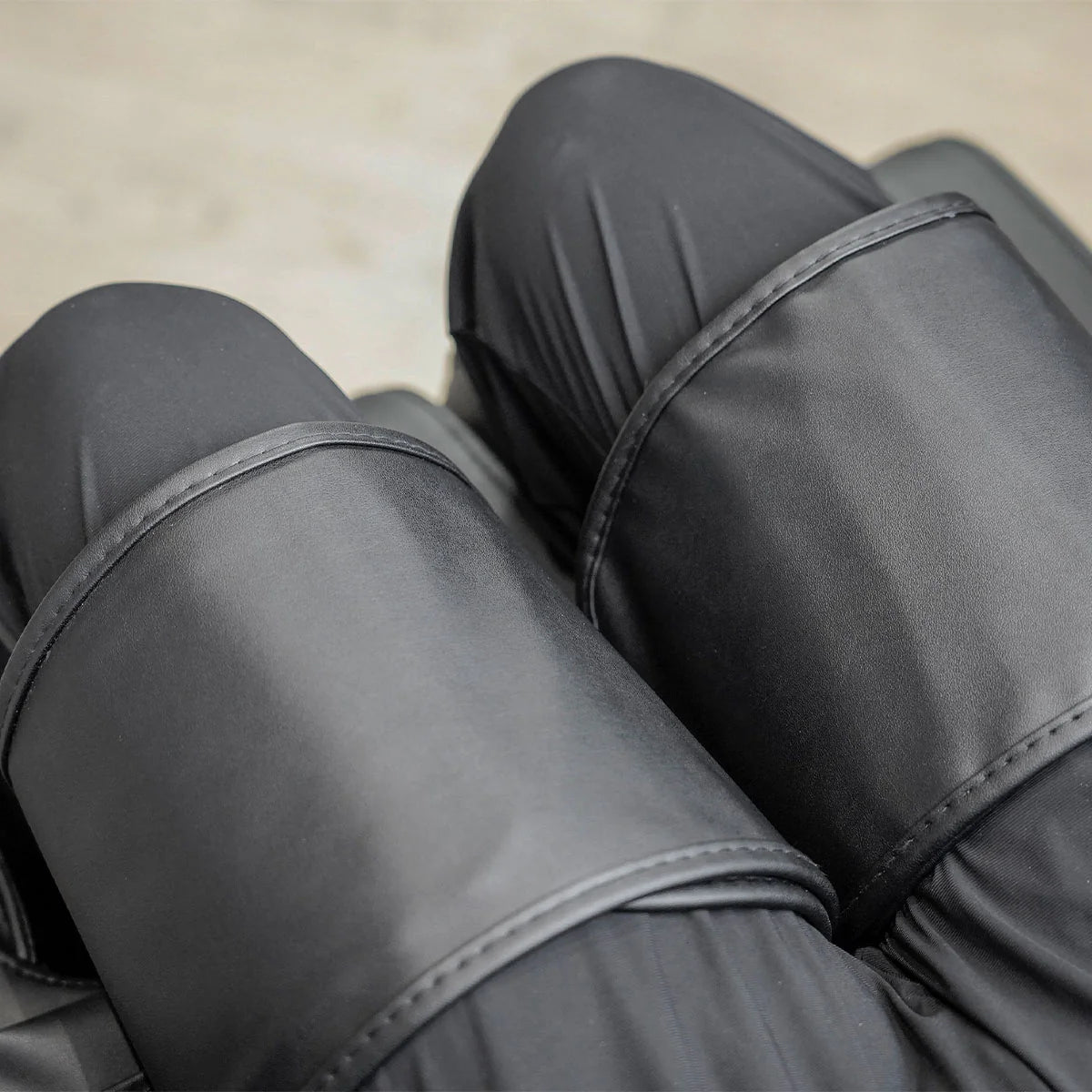 Close-up of black leg massagers on Lifespan Fitness massage chair for leg and calf relaxation