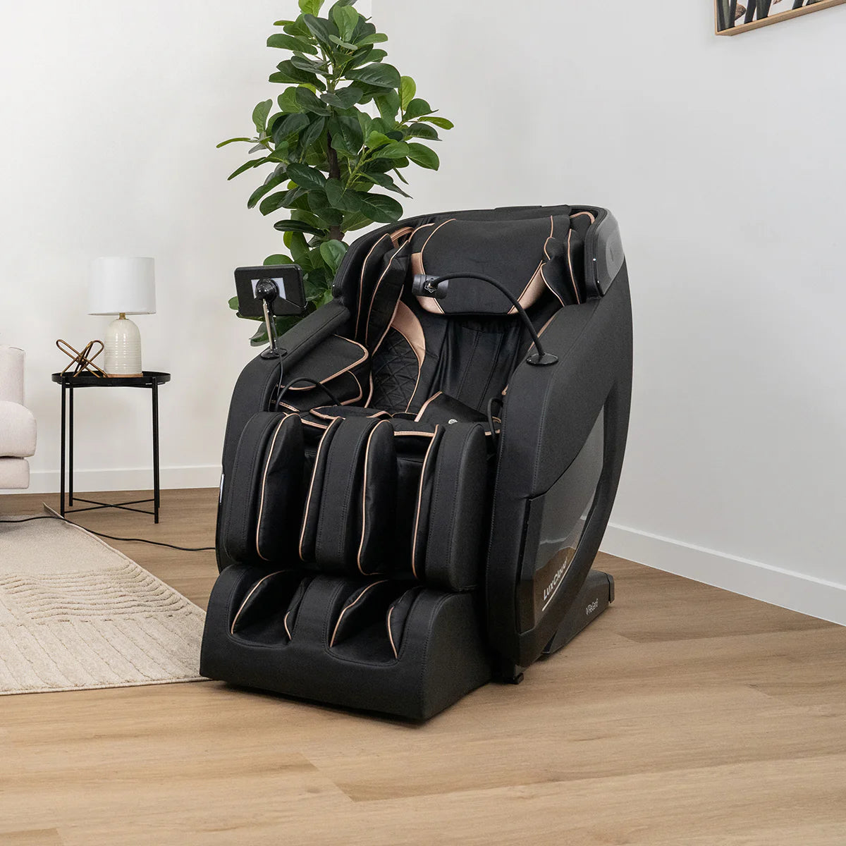 Lifespan Fitness black massage chair with leg and arm massagers in modern living room