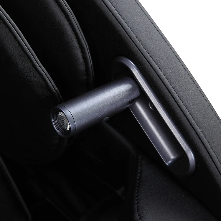 Close-up of adjustable armrest lever on black massage chair by Masseuse Massage Chairs