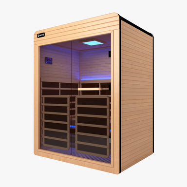 Nuvie infrared sauna cabin with wooden paneling and glass door featuring interior blue lighting