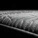 Close-up of Oak Sleep cooled mattress pad showing textured fabric and smart mattress design