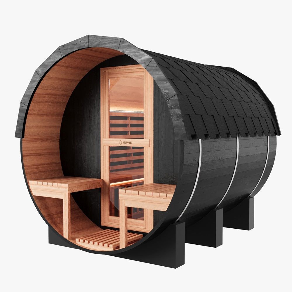 Nuvie outdoor barrel sauna with black exterior and wooden interior benches and door