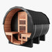 Nuvie outdoor barrel sauna with black exterior and wooden interior benches and door