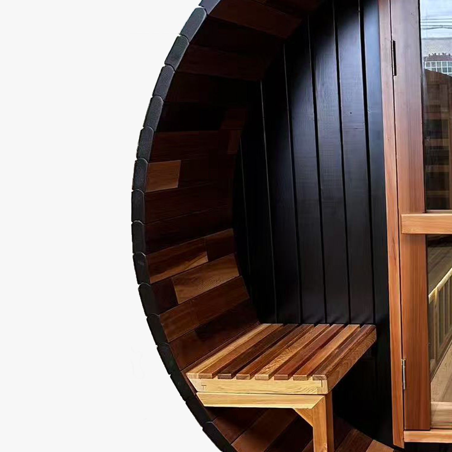 Nuvie outdoor barrel sauna with wooden interior bench and glass door in natural finish