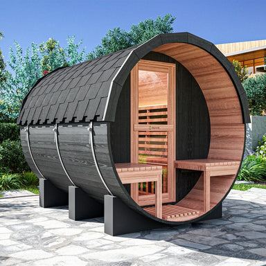 Nuvie outdoor barrel sauna with black exterior and wooden interior benches in backyard setting