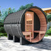 Nuvie outdoor barrel sauna with black exterior and wooden interior benches in backyard setting