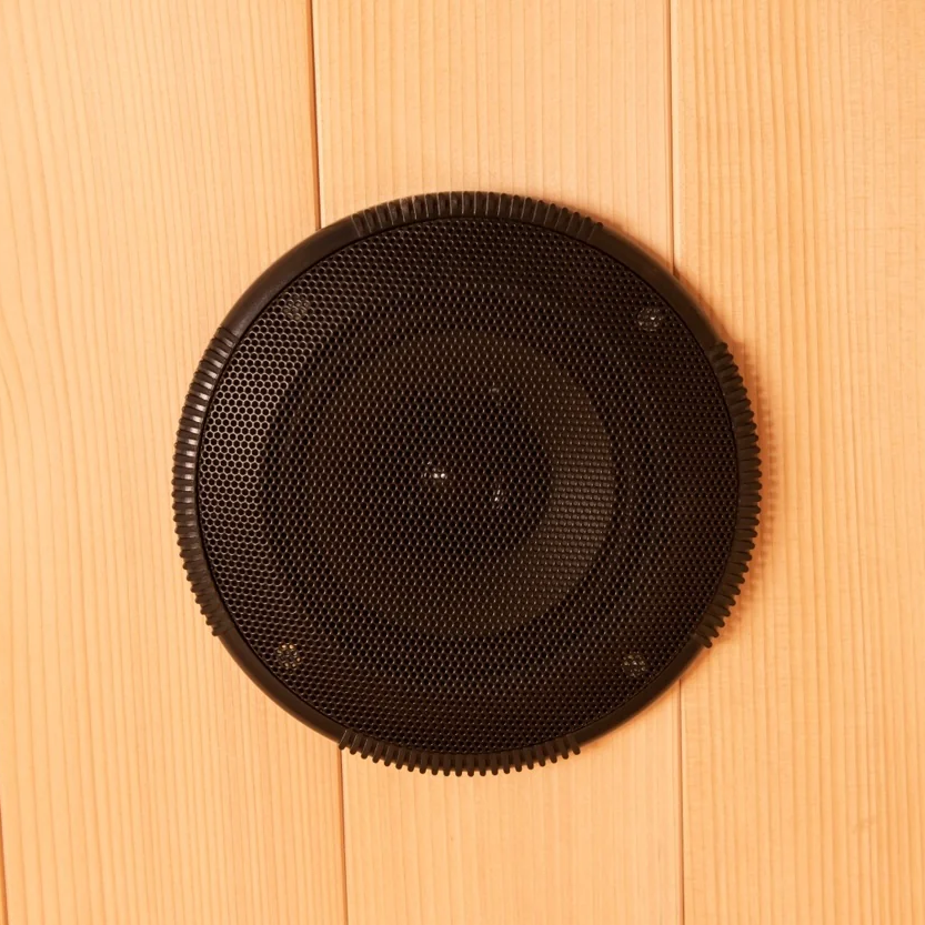 Close-up of black speaker mounted on wooden panel of Chill Bunny outdoor infrared sauna