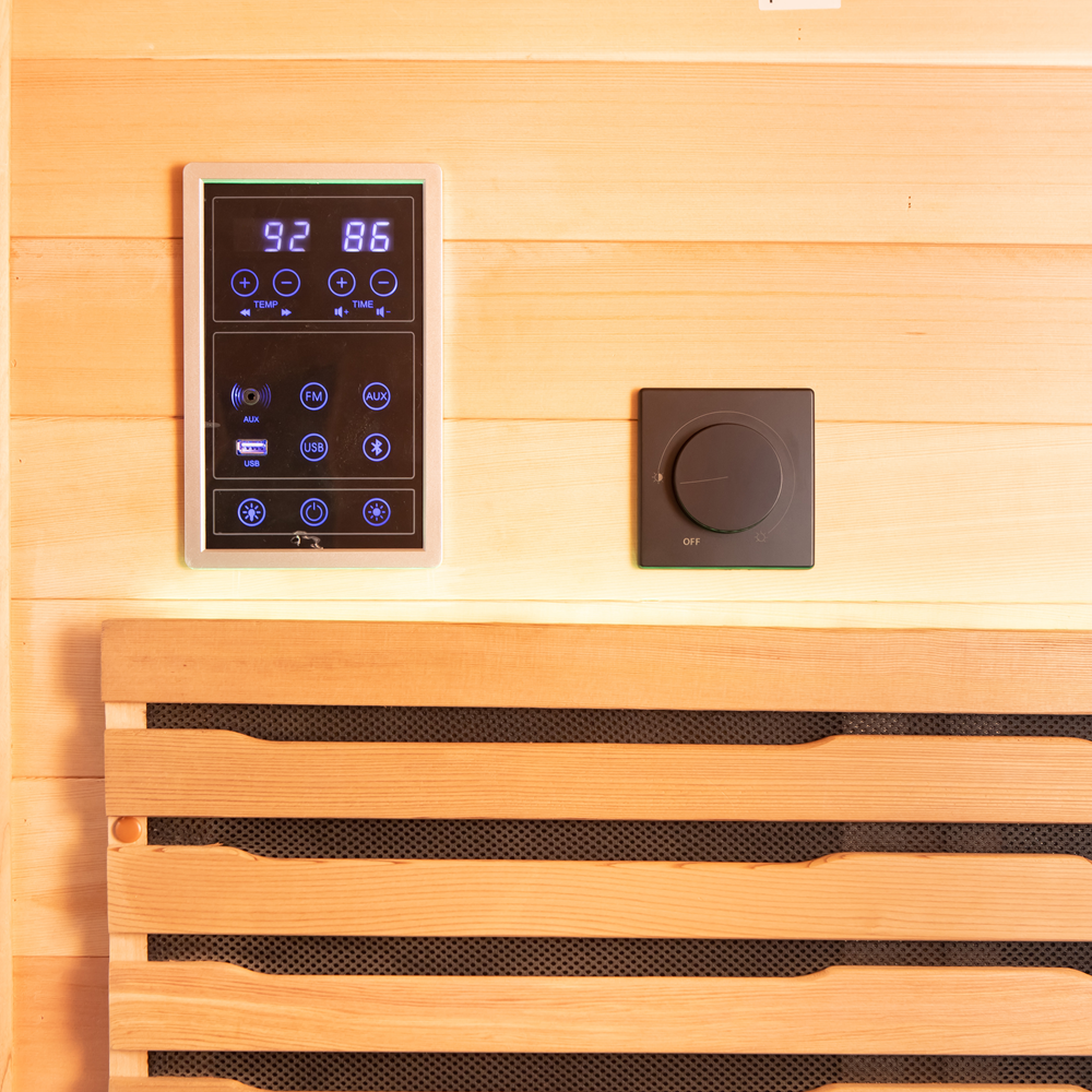 Control panel and wooden bench interior of Chill Bunny outdoor infrared sauna