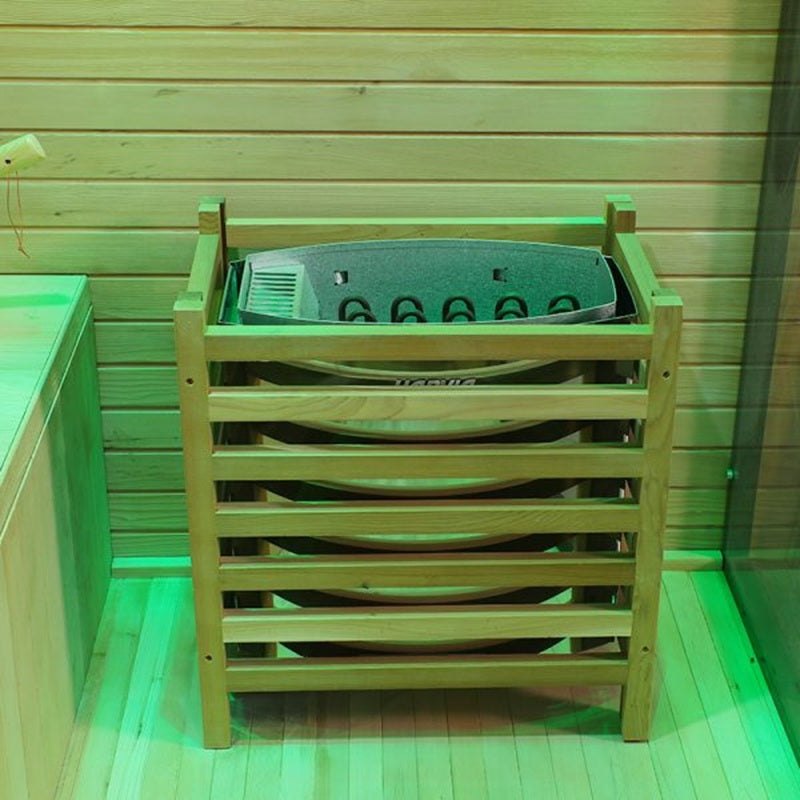 Stryke Recovery outdoor traditional sauna heater with wooden protective frame inside sauna room