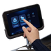 User operating touchscreen control panel on Masseuse massage chair selecting manual massage mode