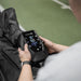 Lifespan Fitness compression boots control panel operated by a person for recovery therapy