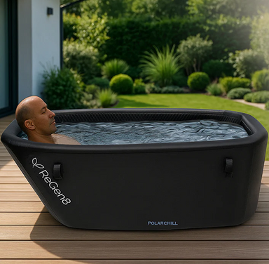 Lifespan Fitness black Regeng Polarchill ice bath with man relaxing outdoors on wooden deck