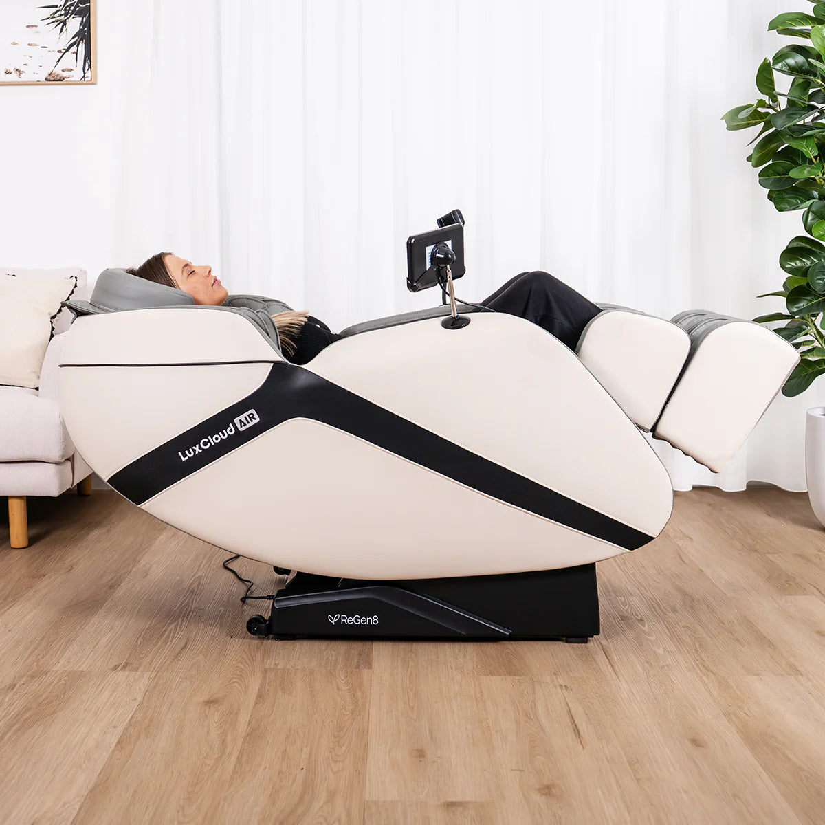 Lifespan Fitness massage chair LuxCloud AIR in white with black accents and reclining feature