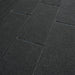 Close-up of Lifespan Fitness sauna textured black floor tiles with interlocking design