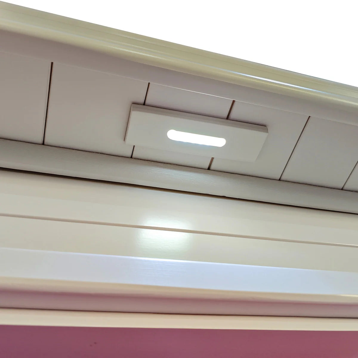 Lifespan Fitness sauna interior ceiling with built-in lighting and wooden panel design
