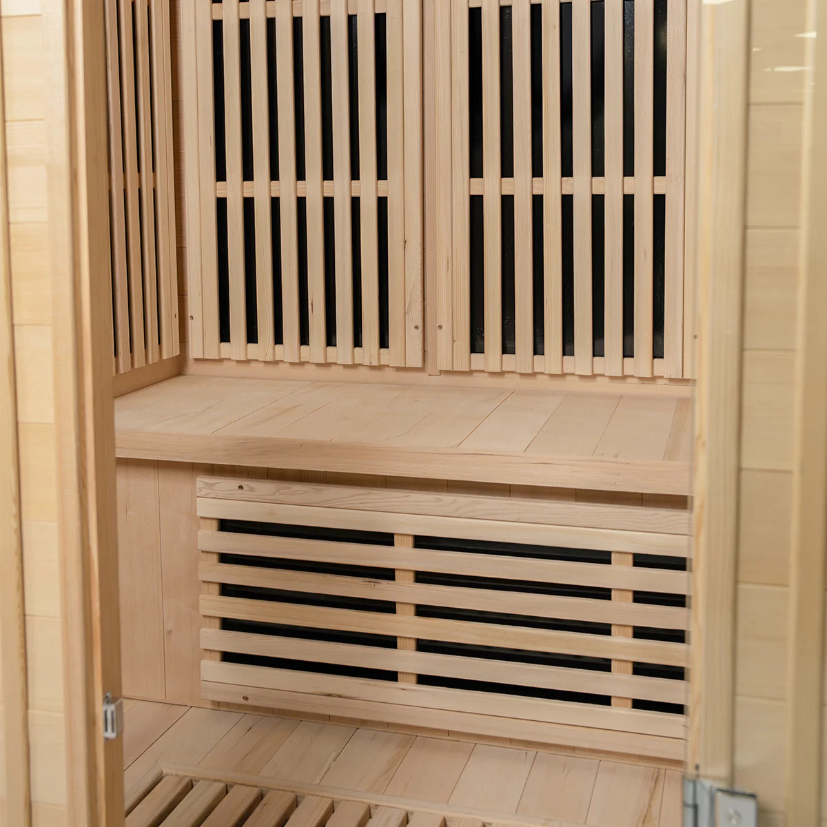 Lifespan Fitness wooden sauna interior with bench and slatted wood panels for heating elements