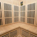 Lifespan Fitness sauna interior with wooden benches and black heating panels for relaxation