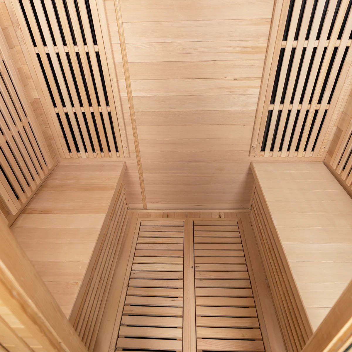 Lifespan Fitness wooden sauna interior with bench seating and slatted walls for heat ventilation