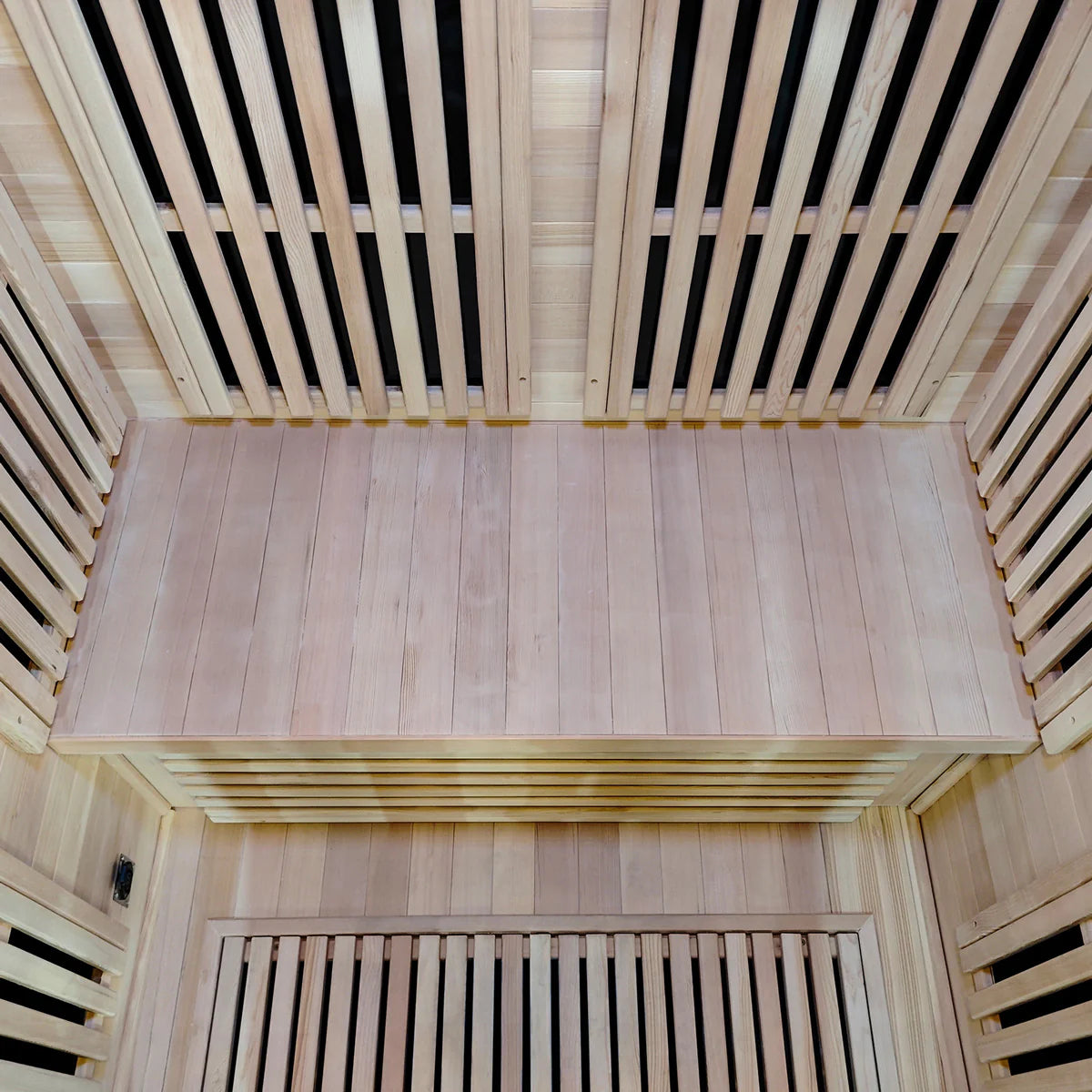 Interior view of Lifespan Fitness wooden sauna with bench and slatted walls for heat circulation