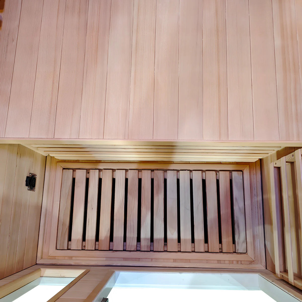 Interior view of Lifespan Fitness wooden sauna with wooden slatted bench and paneling