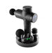 Black s50 stryke massage gun with attachments and charger on a white background