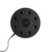 Stryke Recovery massage gun charging base with circular design and multiple slots for attachment heads