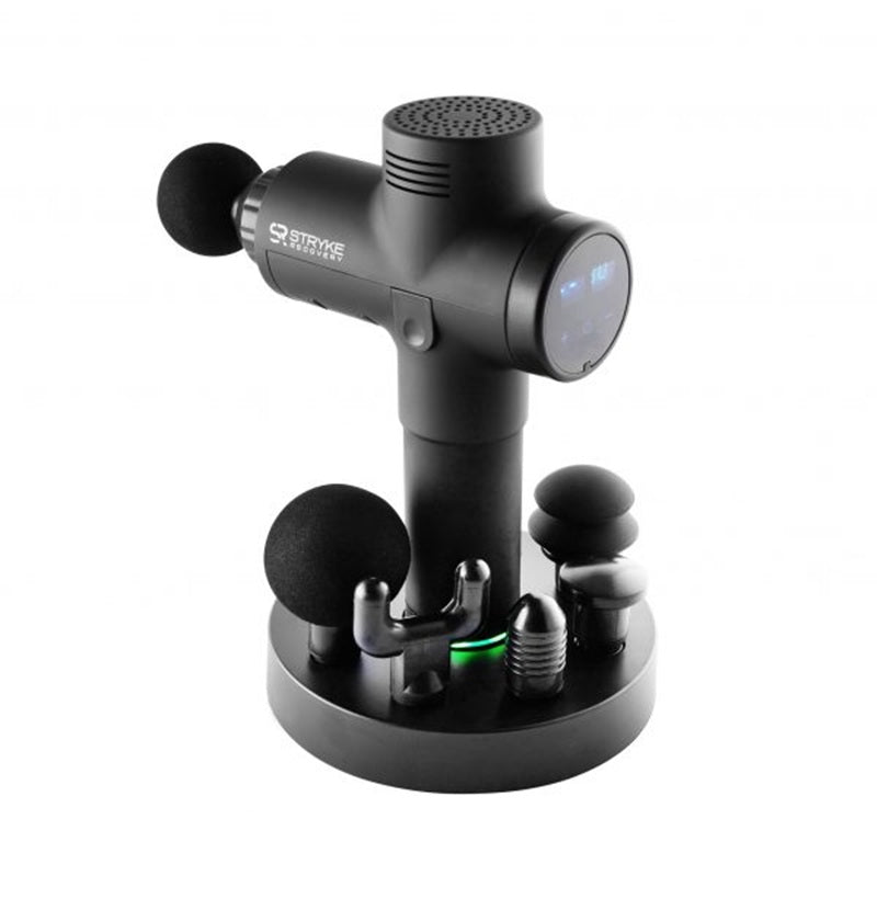 Stryke Recovery black massage gun with digital display and five interchangeable massage heads on a round base