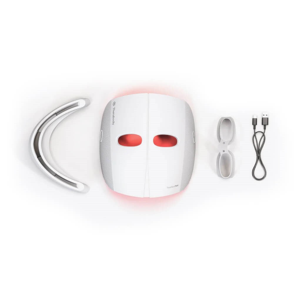 Therabody LED face mask therapy kit with eye protection, curved LED neck device, and charging cable