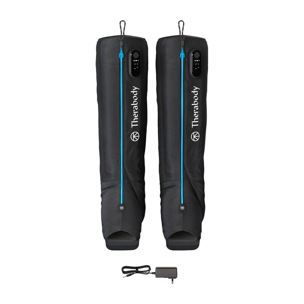 Therabody black compression boots with blue zippers and control panels for recovery therapy