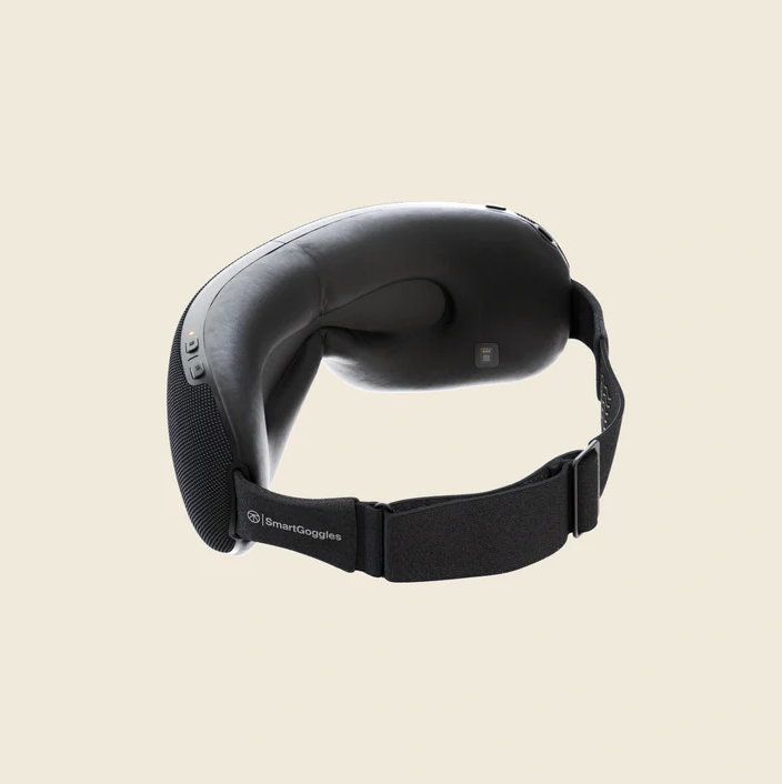 Therabody black eye and temple massager with adjustable strap for comfortable fit
