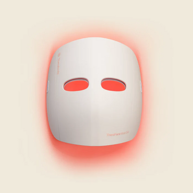 Therabody LED mask white therapy mask emitting red light for skin treatment