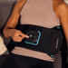 woman using the therabody recoverytherm back 