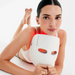 kendall jenner holding therabody theraface mask glo