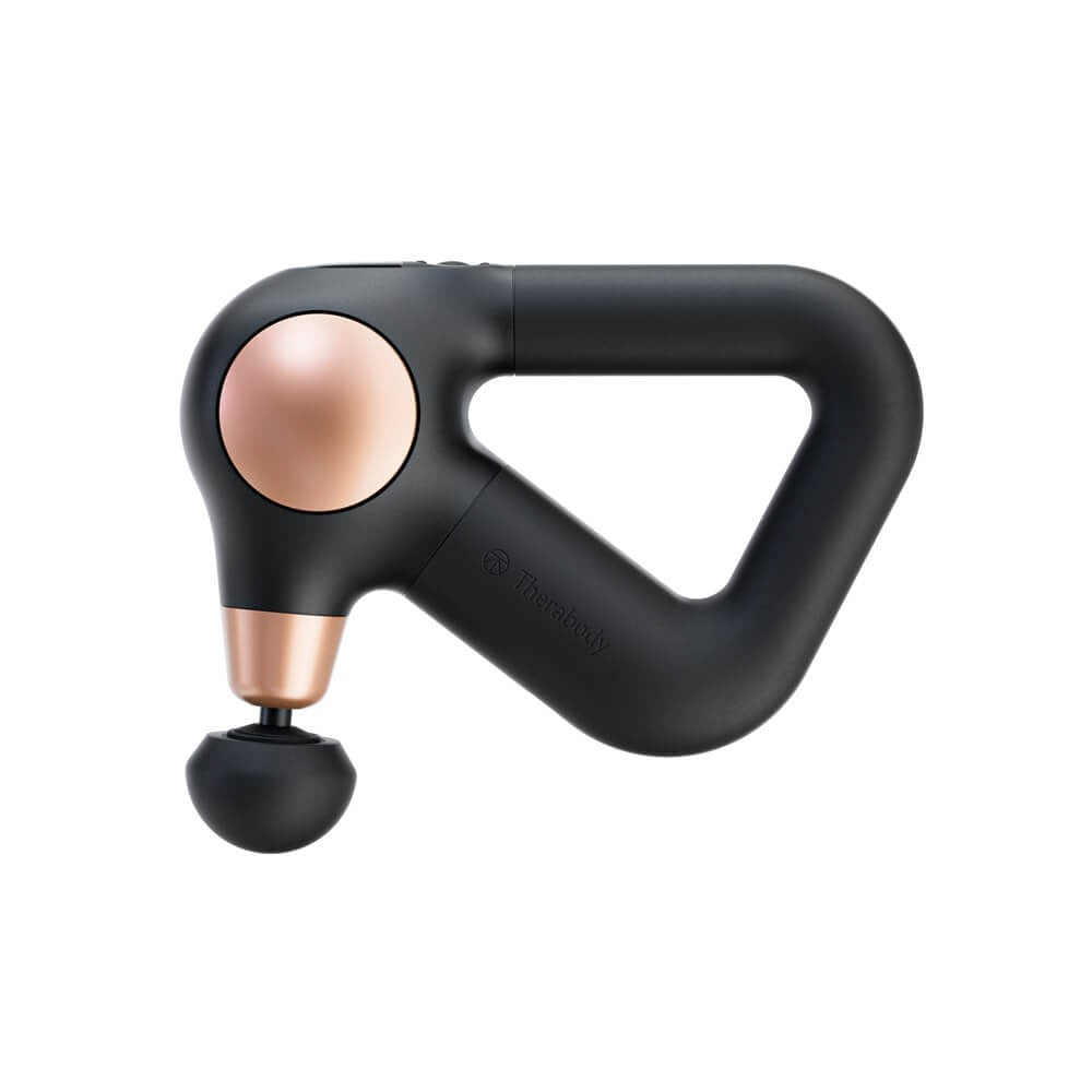Therabody massage gun in black and rose gold with ergonomic triangular handle and round attachment