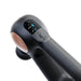 Therabody massage gun in black with digital display showing speed and battery level