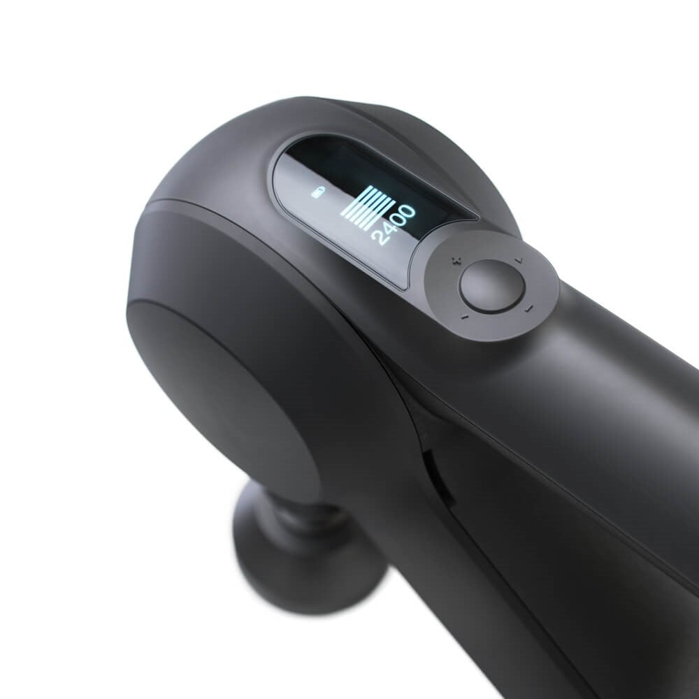 Therabody massage gun in black with digital display showing speed setting and control dial