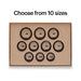 Ultrahuman smart ring sizing kit with 10 black ring sizes on a brown tray for accurate fit