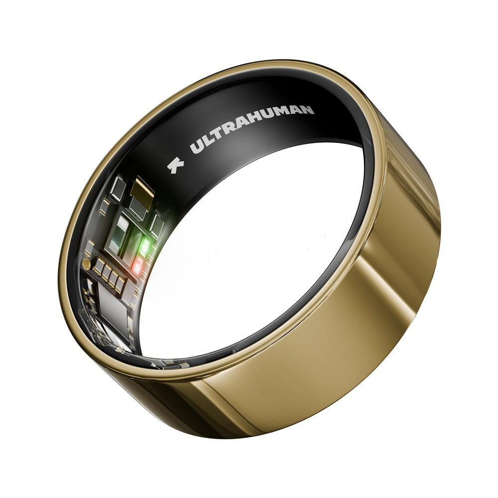 Ultrahuman smart ring with gold exterior and visible internal sensors for health tracking